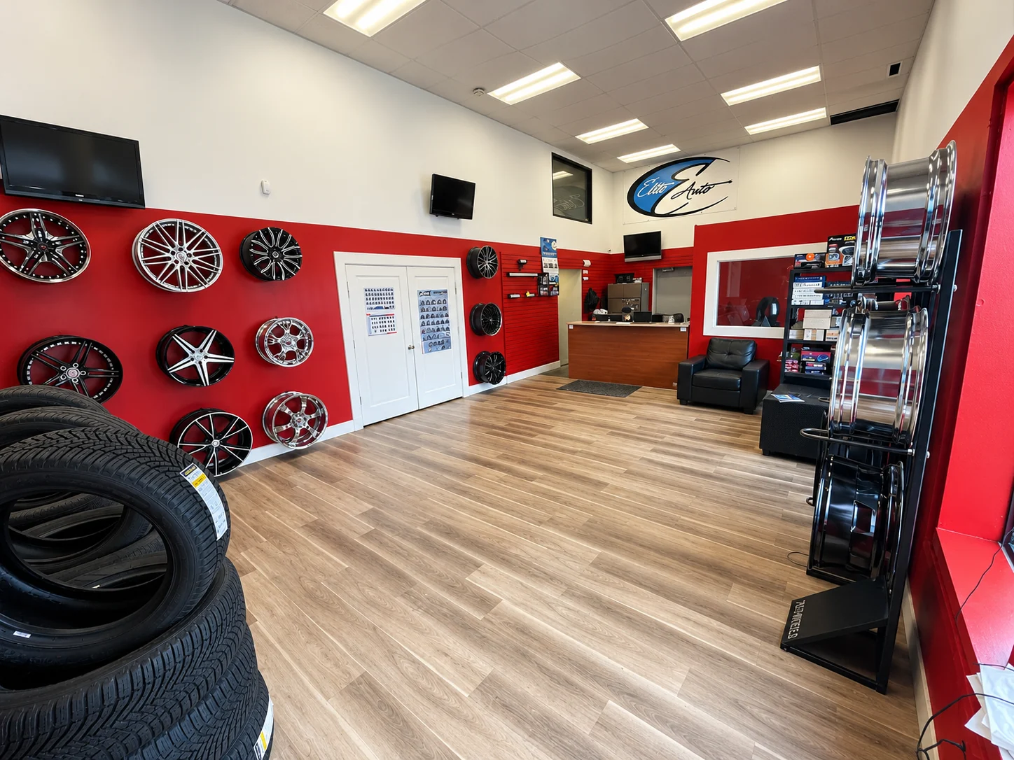 Tires and wheels displayed in the Elite Autoworks showroom